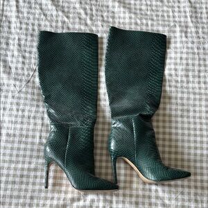 Knee high heeled boots